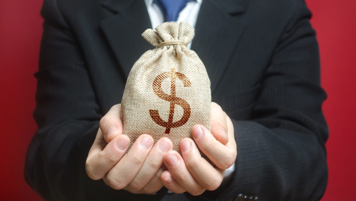 men holding money